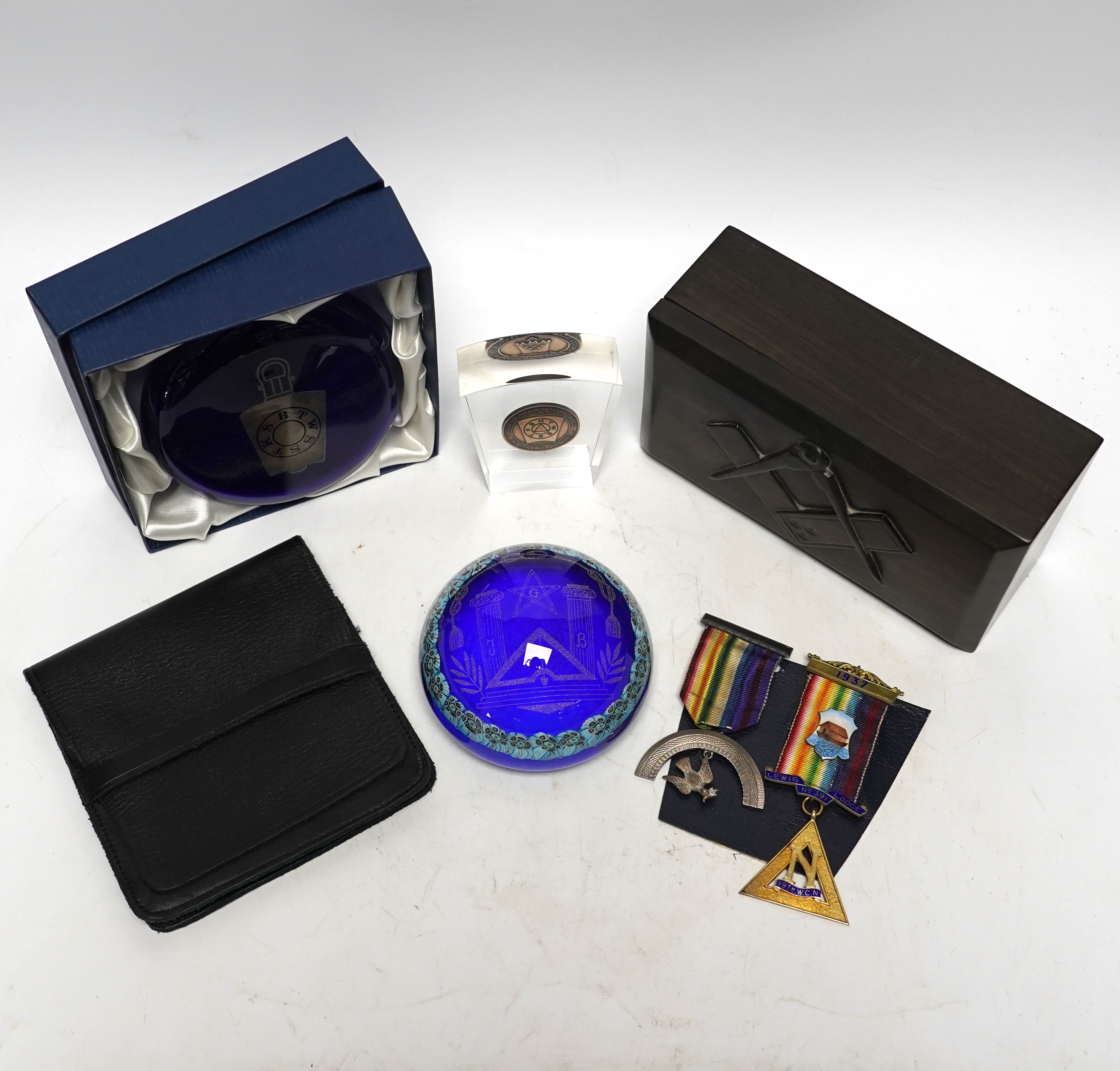 Lewes related Masonic items; to include a set of medals, a box, a box and two paperweights